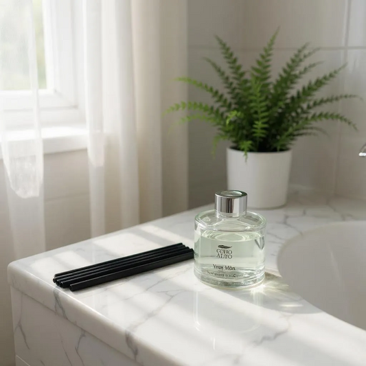 Ynys Mon Clear 100ml Reed diffuser with black reeds.