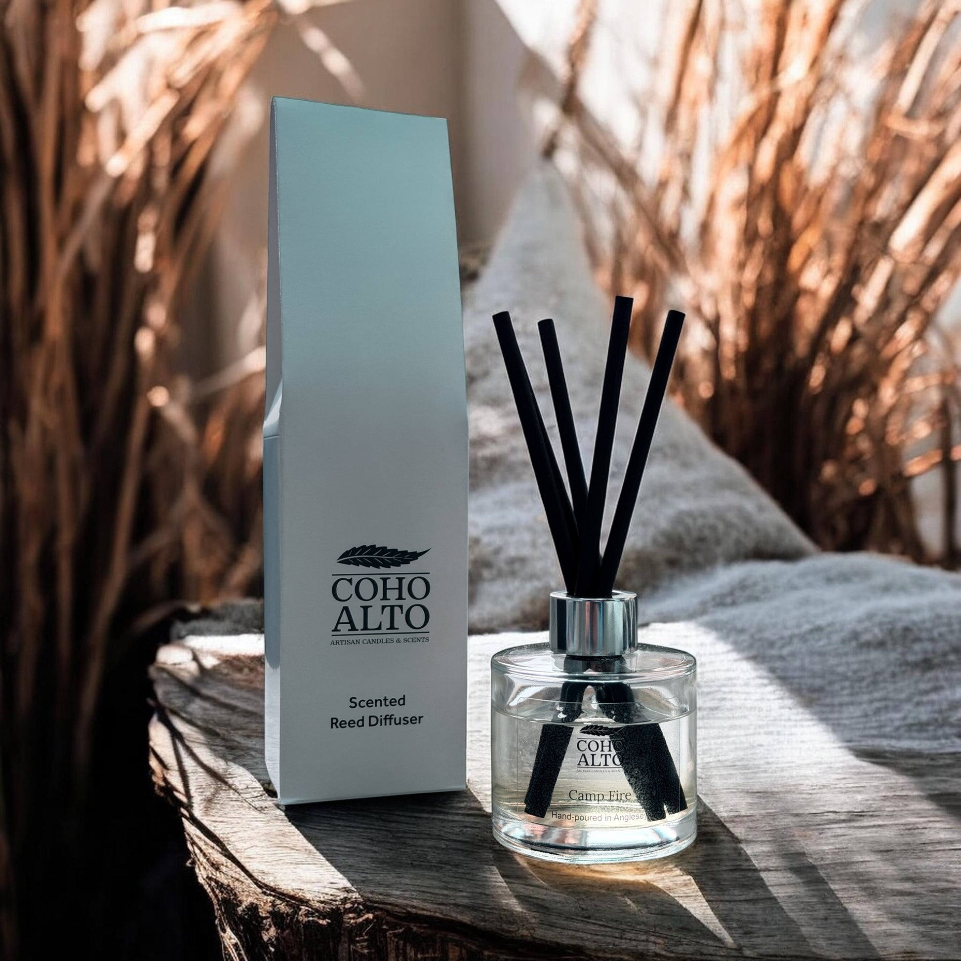Coho Alto autumn reed diffuser set on a wooden surface with natural background