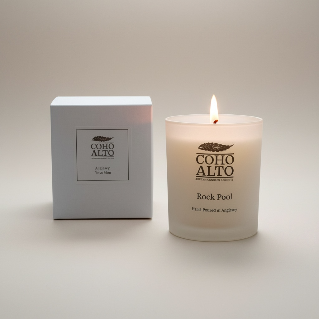 Coho Alto candle and packaging on a light background